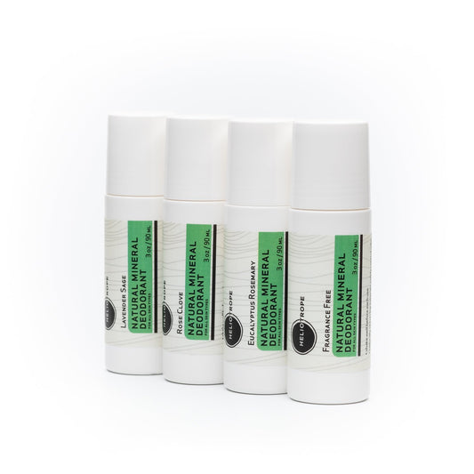 Natural mineral roll-on deodorant bottles with green labels