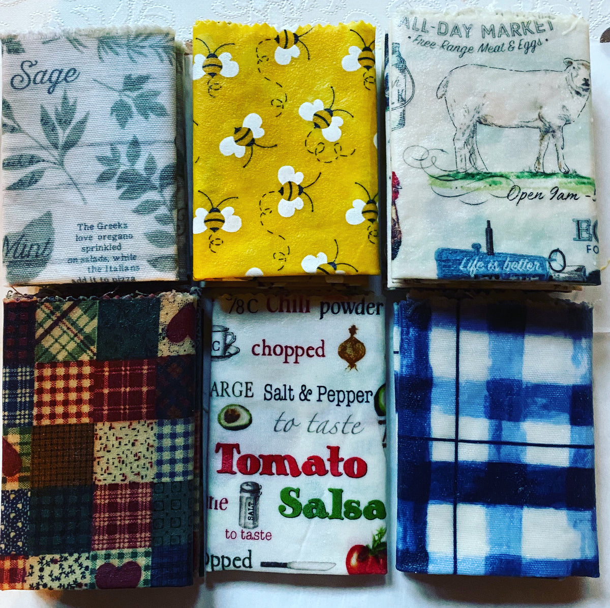 Reusable beeswax food wraps in assorted patterns and sizes