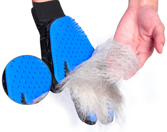 Reusable blue pet hair remover glove collecting loose fur