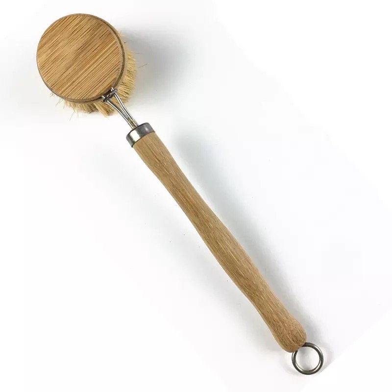 Bamboo sisal dish brush with a natural wooden handle and replaceable head.