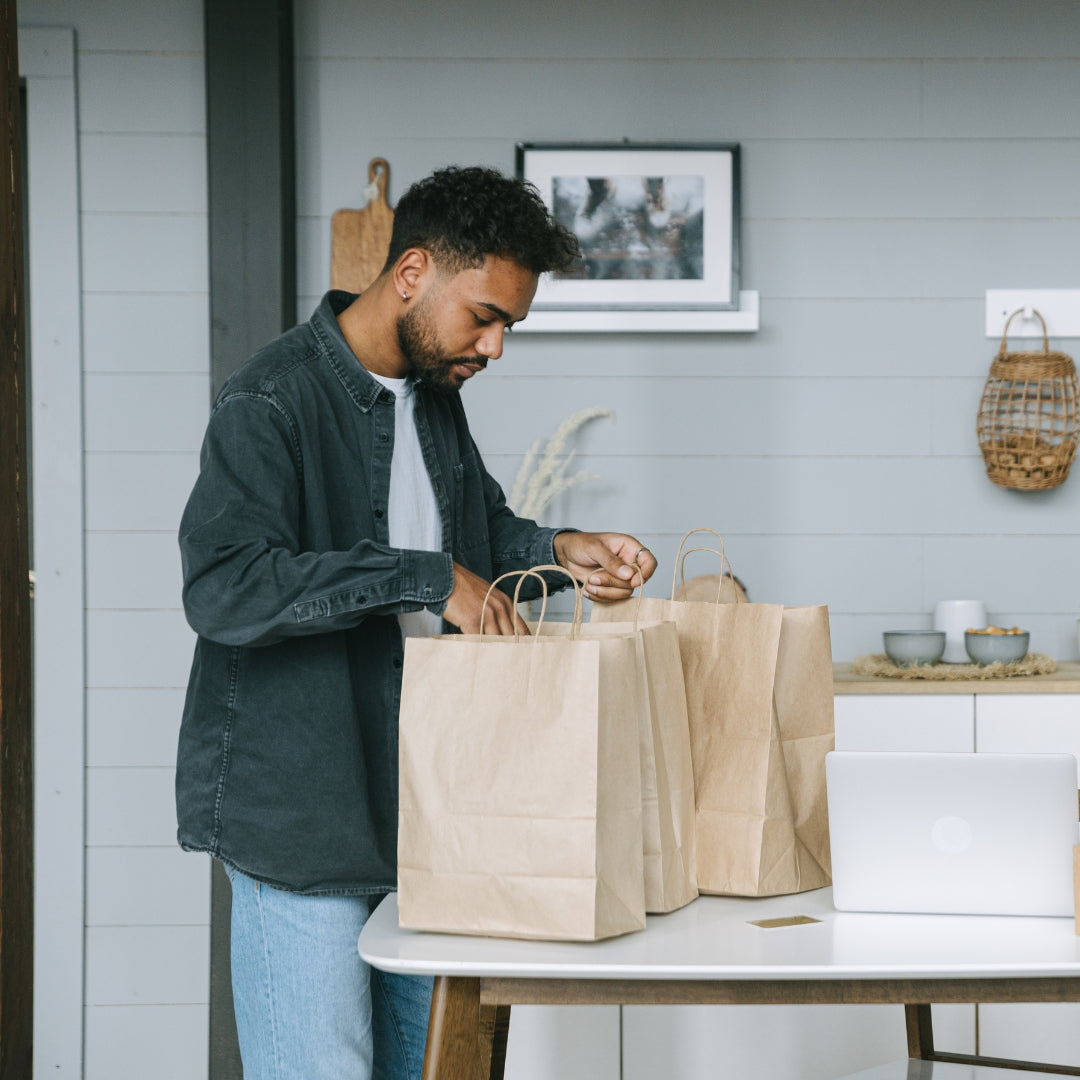 Unpacking groceries from paper bags