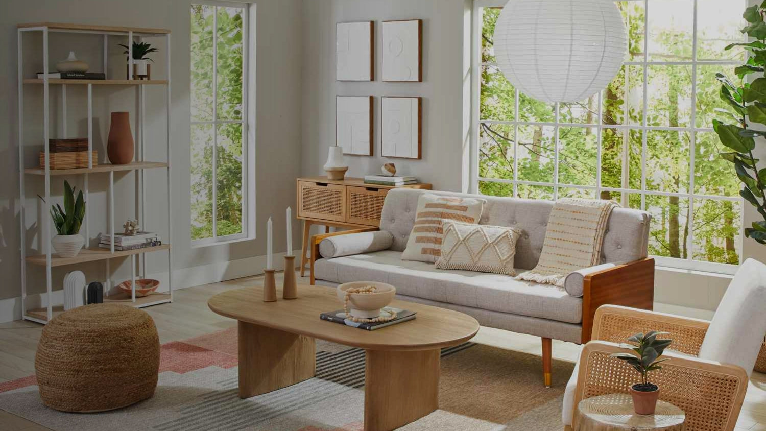 Modern living room with a sofa, coffee table, and decorative items.